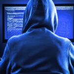 The current image has no alternative text. The file name is: man-in-hoody-at-keyboard.jpg